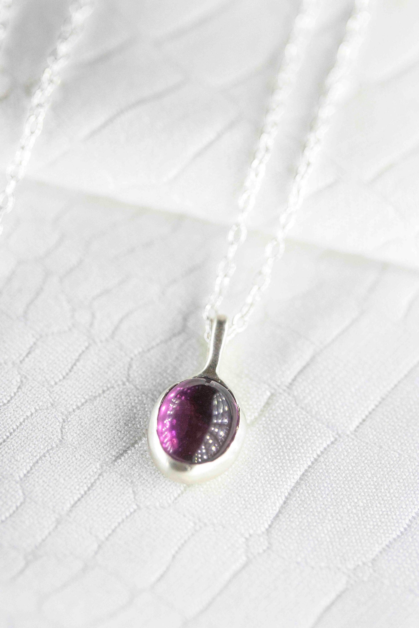 Collection de pendentifs en pierres précieuses